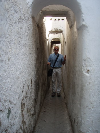 Jim in narrow street